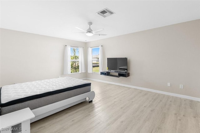 2811 44th St W, Lehigh Acres, FL 33971 - bedroom with light wood-style flooring and a ceiling fan