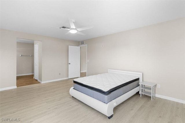 2811 44th St W, Lehigh Acres, FL 33971 - bedroom with light wood-style flooring and a ceiling fan