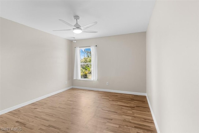 2811 44th St W, Lehigh Acres, FL 33971 - empty room with light wood-style floors and ceiling fan