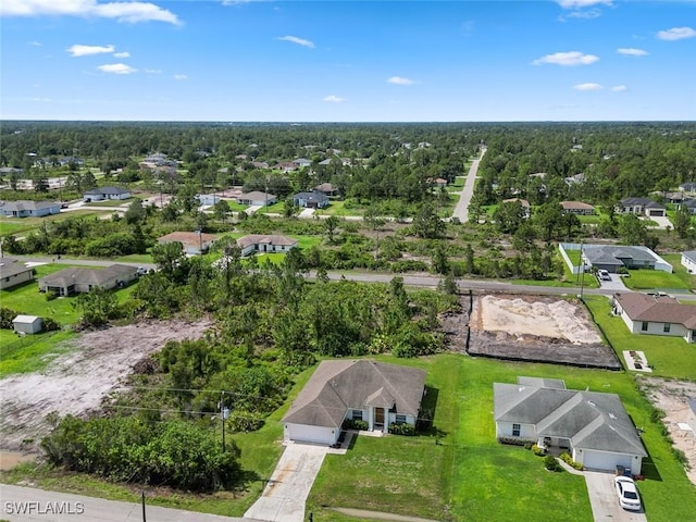 2811 44th St W, Lehigh Acres, FL 33971 - aerial perspective of suburban area with a heavily wooded area