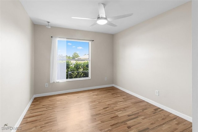 2811 44th St W, Lehigh Acres, FL 33971 - empty room featuring light wood-style floors and ceiling fan