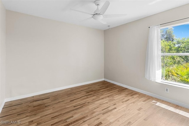 2811 44th St W, Lehigh Acres, FL 33971 - spare room with light wood-style flooring and ceiling fan
