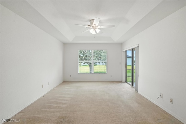 4322 NW 32nd Ter, Cape Coral, FL 33993 - unfurnished room featuring ceiling fan, light carpet, and a raised ceiling