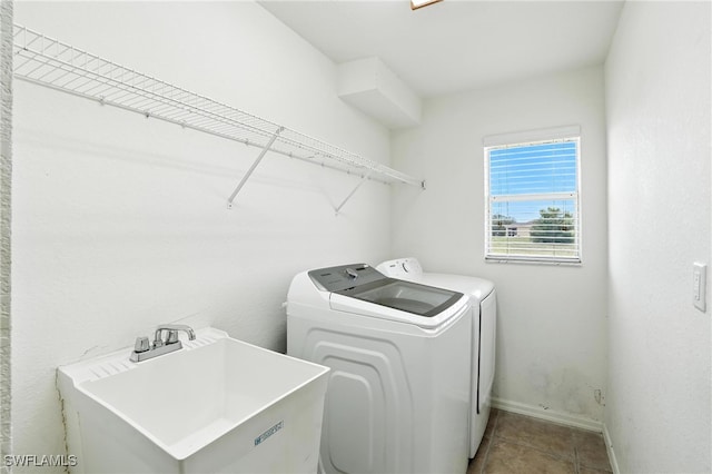 4322 NW 32nd Ter, Cape Coral, FL 33993 - washroom featuring separate washer and dryer and tile patterned floors