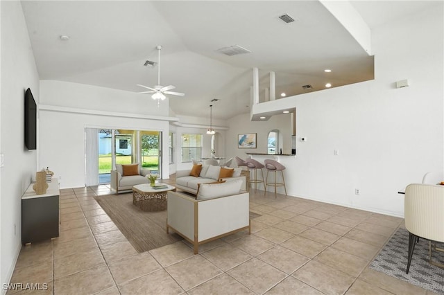 4322 NW 32nd Ter, Cape Coral, FL 33993 - living area with a ceiling fan, light tile patterned floors, recessed lighting, and high vaulted ceiling