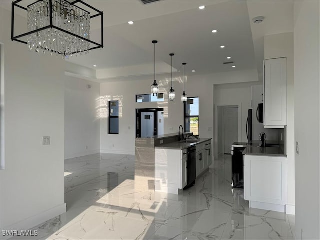 707 NE Juanita Place, Cape Coral, FL 33909 - kitchen featuring dishwasher, recessed lighting, light marble finish flooring, white cabinets, and open floor plan