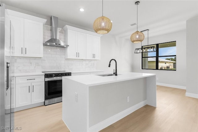 1299 Argosy Rd, Labelle, FL 33935 - kitchen featuring wall chimney exhaust hood, electric range oven, light wood-type flooring, backsplash, and light countertops