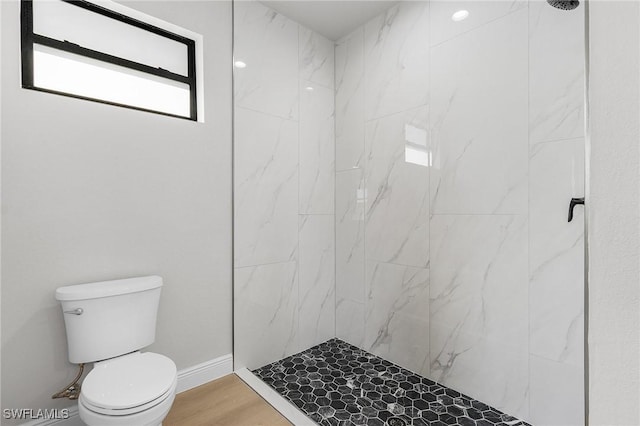 1299 Argosy Rd, Labelle, FL 33935 - bathroom with a marble finish shower and wood finished floors