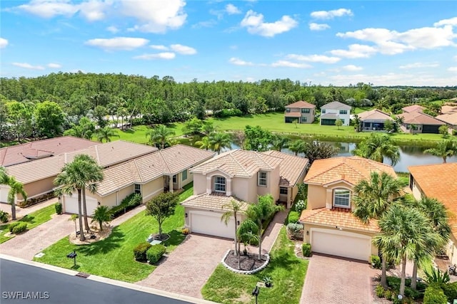 10490 Spruce Pine Ct, Fort Myers, FL 33913 - aerial perspective of suburban area featuring a nearby body of water