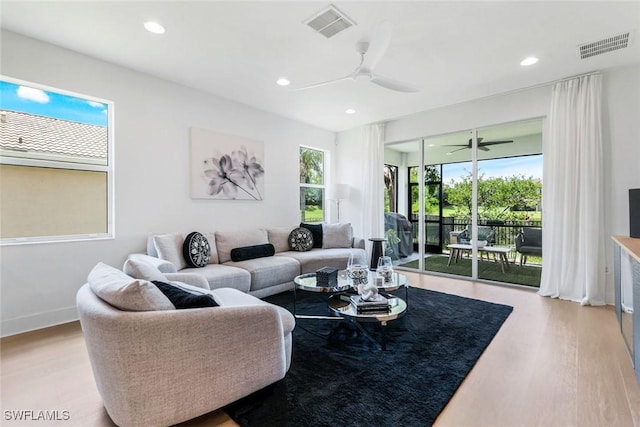 10490 Spruce Pine Ct, Fort Myers, FL 33913 - living room featuring wood finished floors, a ceiling fan, and recessed lighting