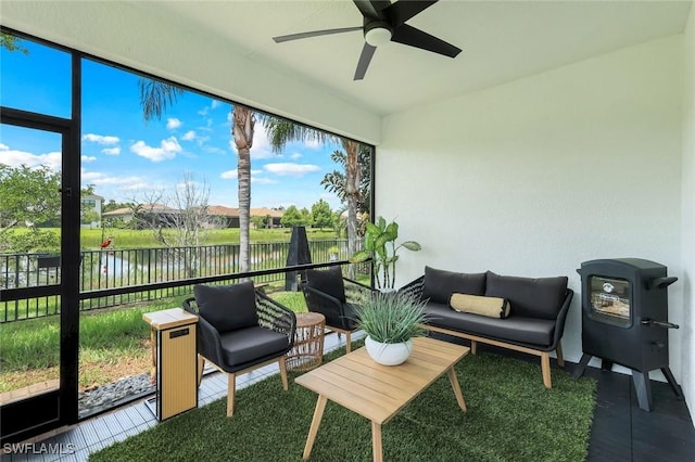 10490 Spruce Pine Ct, Fort Myers, FL 33913 - sunroom / solarium featuring a water view, a ceiling fan, and an outdoor living space