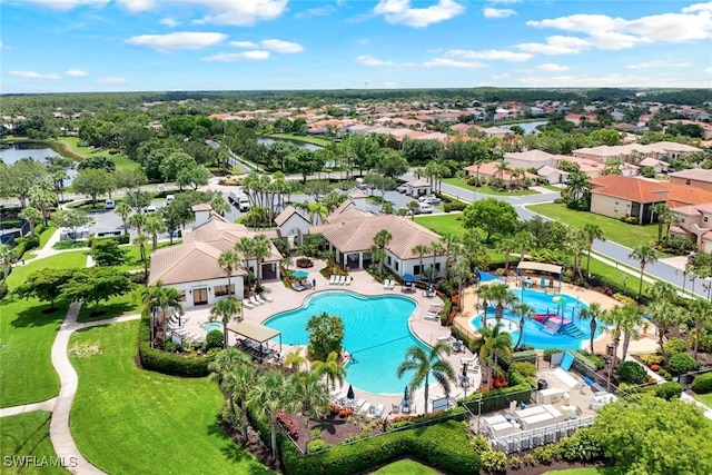 10490 Spruce Pine Ct, Fort Myers, FL 33913 - aerial perspective of suburban area featuring a pool area and a large body of water