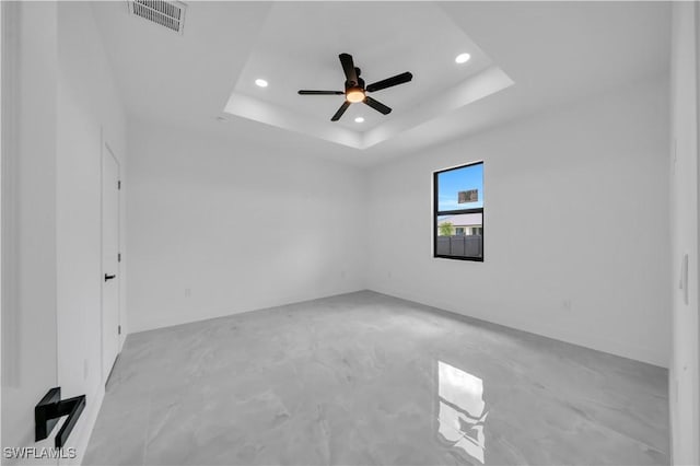 2018 Nelson Rd N, Cape Coral, FL 33993 - unfurnished room with recessed lighting, a raised ceiling, and ceiling fan