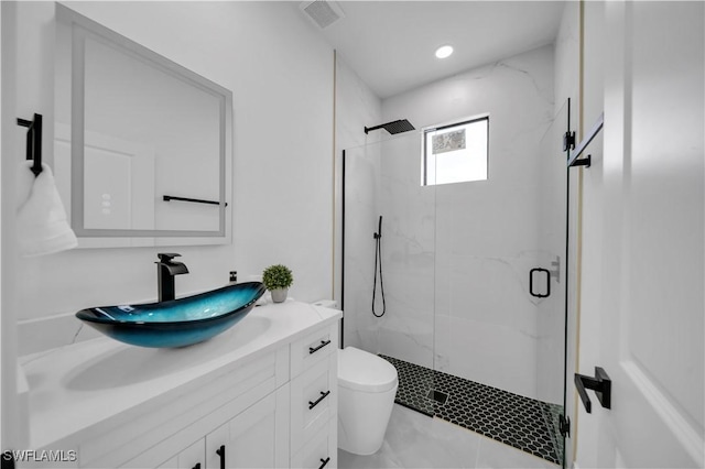 2018 Nelson Rd N, Cape Coral, FL 33993 - bathroom featuring vanity and a marble finish shower