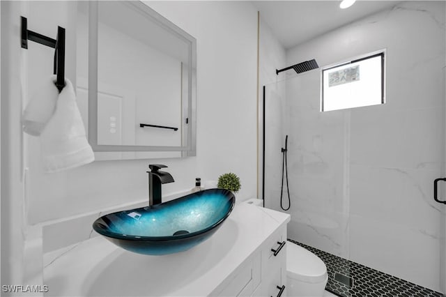 2018 Nelson Rd N, Cape Coral, FL 33993 - full bathroom with a marble finish shower and vanity