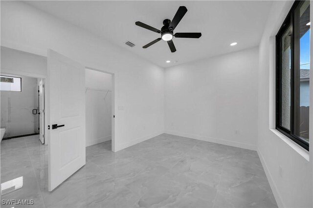 2018 Nelson Rd N, Cape Coral, FL 33993 - unfurnished room featuring light marble finish flooring, a ceiling fan, and recessed lighting