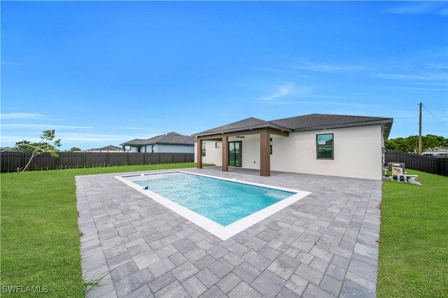 2018 Nelson Rd N, Cape Coral, FL 33993 - view of pool with a patio and a fenced backyard