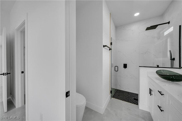 2018 Nelson Rd N, Cape Coral, FL 33993 - full bath with a marble finish shower, vanity, recessed lighting, and marble finish floors