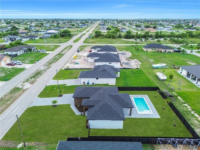 2018 Nelson Rd N, Cape Coral, FL 33993 - aerial view of residential area featuring a pool