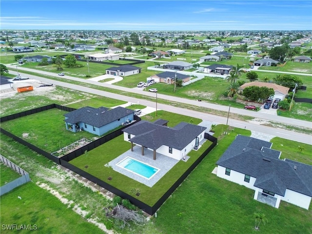 2018 Nelson Rd N, Cape Coral, FL 33993 - aerial perspective of suburban area with a pool