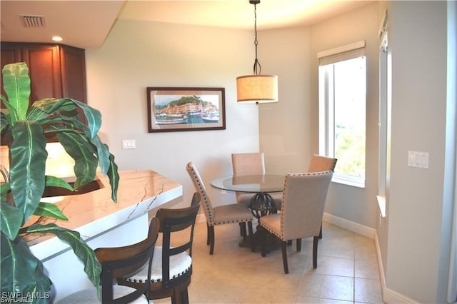 4182 Bay Beach Ln Unit 752, Fort Myers Beach, FL 33931 - dining area with baseboards and light tile patterned floors