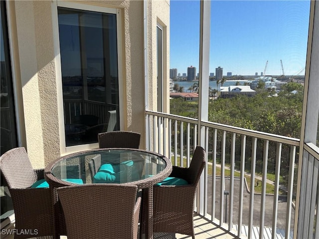 4182 Bay Beach Ln Unit 752, Fort Myers Beach, FL 33931 - balcony featuring a view of skyline and outdoor dining area