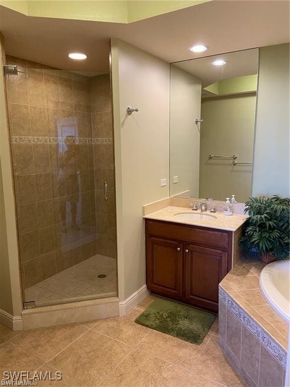 4182 Bay Beach Ln Unit 752, Fort Myers Beach, FL 33931 - full bathroom with a stall shower, a bath, vanity, tile patterned flooring, and recessed lighting