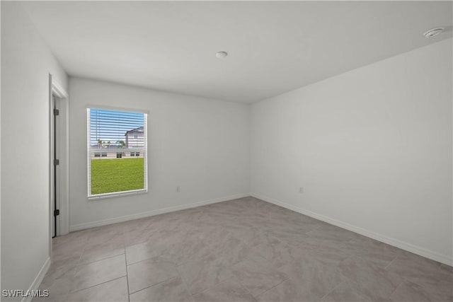 17620 Monte Isola Way N, Fort Myers, FL 33917 - unfurnished room with a smoke detector and baseboards