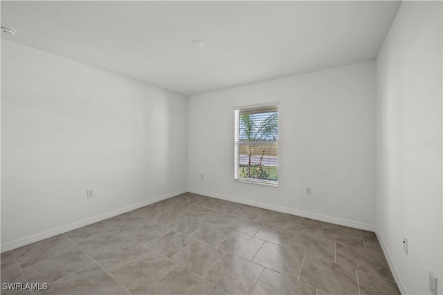 17620 Monte Isola Way N, Fort Myers, FL 33917 - unfurnished room featuring baseboards