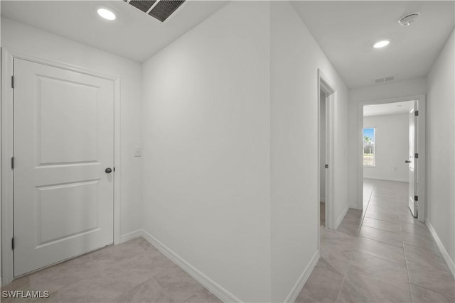 17620 Monte Isola Way N, Fort Myers, FL 33917 - hall with recessed lighting and light tile patterned flooring