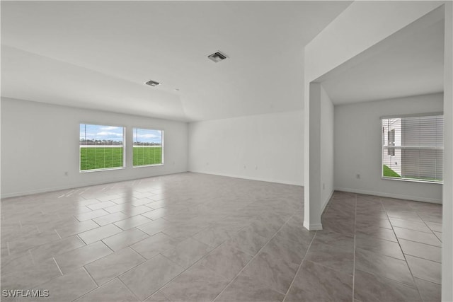 17620 Monte Isola Way N, Fort Myers, FL 33917 - empty room with tile patterned floors and baseboards