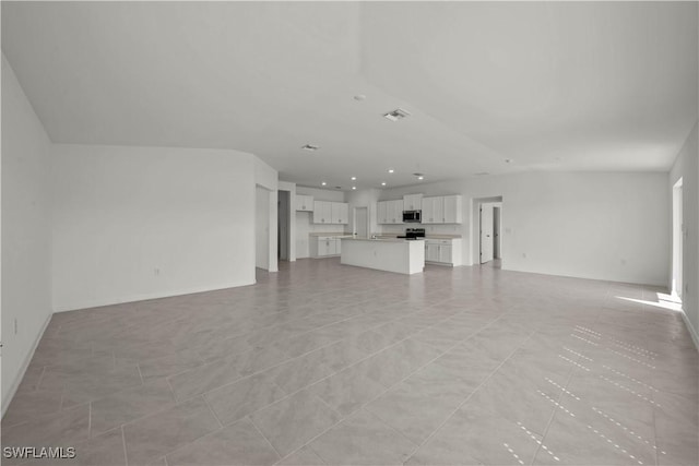 17620 Monte Isola Way N, Fort Myers, FL 33917 - unfurnished living room with recessed lighting