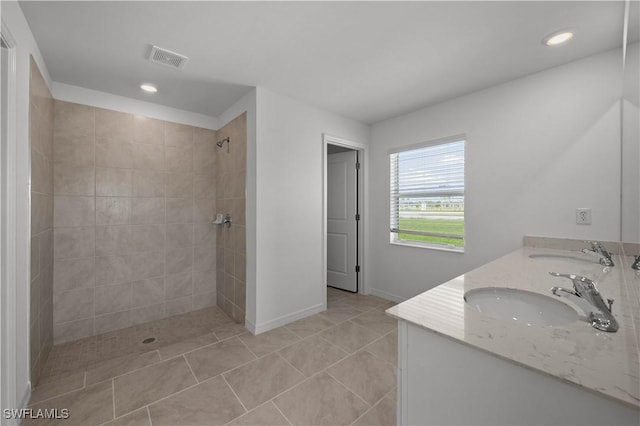 17620 Monte Isola Way N, Fort Myers, FL 33917 - full bathroom with a tile shower, double vanity, tile patterned floors, and recessed lighting