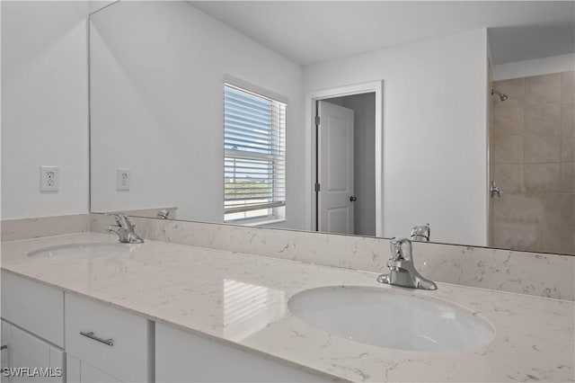 17620 Monte Isola Way N, Fort Myers, FL 33917 - bathroom featuring double vanity and a shower