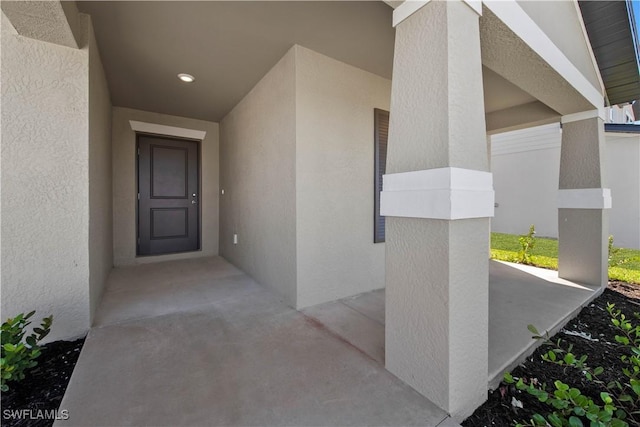 17620 Monte Isola Way N, Fort Myers, FL 33917 - property entrance with stucco siding