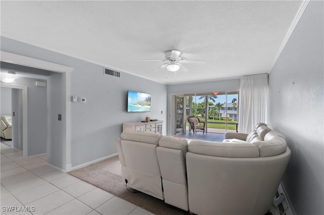418 12th Ave S Unit C418, Naples, FL 34102 - living area with a ceiling fan and light tile patterned floors