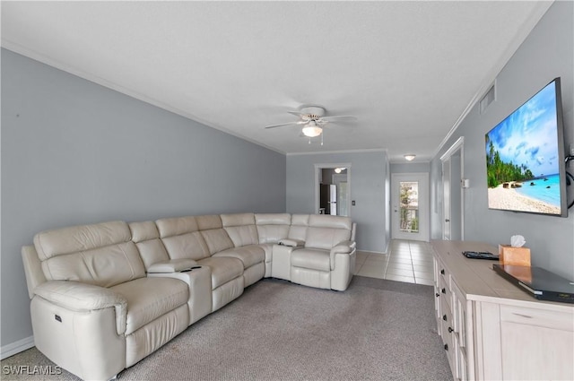 418 12th Ave S Unit C418, Naples, FL 34102 - living room featuring ceiling fan, light colored carpet, crown molding, and light tile patterned floors