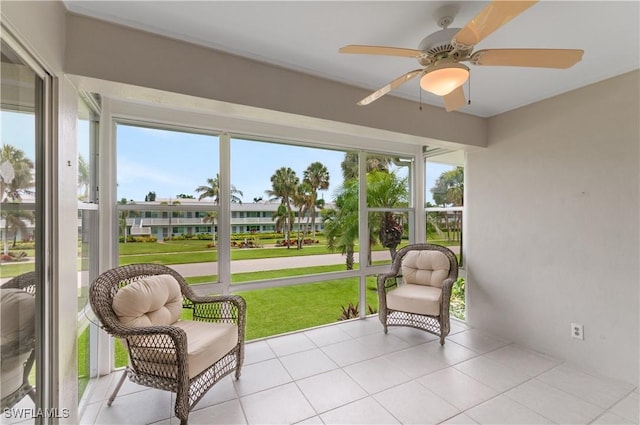 418 12th Ave S Unit C418, Naples, FL 34102 - sunroom featuring healthy amount of natural light and a ceiling fan