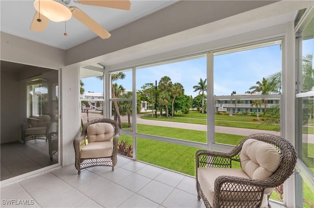 418 12th Ave S Unit C418, Naples, FL 34102 - sunroom with plenty of natural light and a ceiling fan
