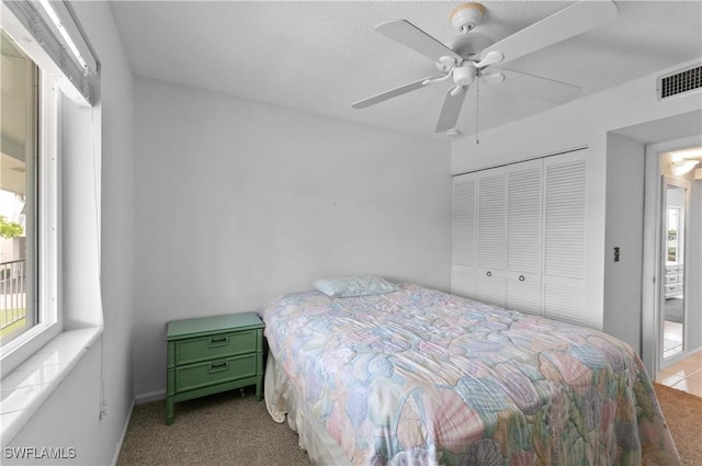 418 12th Ave S Unit C418, Naples, FL 34102 - bedroom featuring carpet flooring, a closet, and ceiling fan