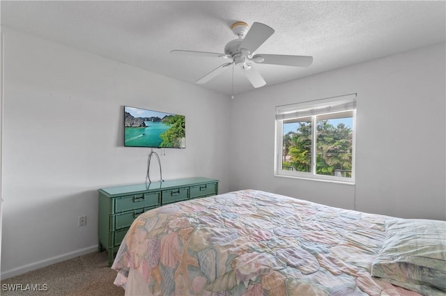 418 12th Ave S Unit C418, Naples, FL 34102 - carpeted bedroom with a ceiling fan and a textured ceiling