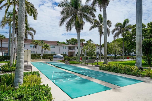 418 12th Ave S Unit C418, Naples, FL 34102 - view of swimming pool with shuffleboard