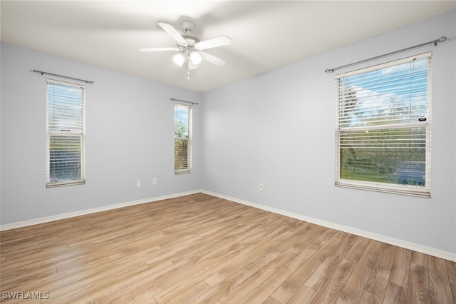 343 Golden Gate Blvd E, Naples, FL 34120 - empty room featuring light wood finished floors and a ceiling fan