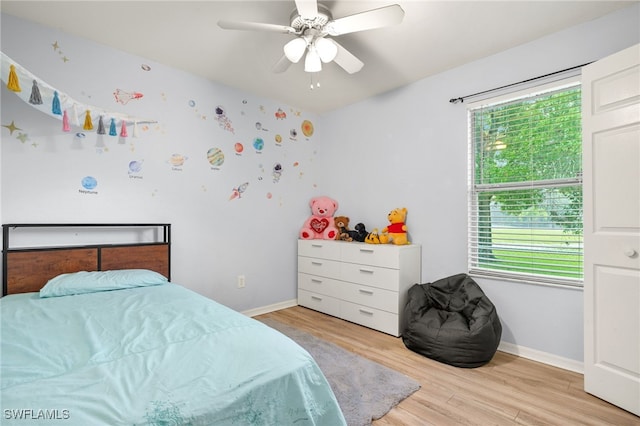343 Golden Gate Blvd E, Naples, FL 34120 - bedroom featuring light wood-type flooring and ceiling fan