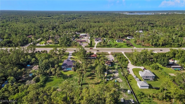 343 Golden Gate Blvd E, Naples, FL 34120 - aerial view of property and surrounding area featuring a forest and nearby suburban area