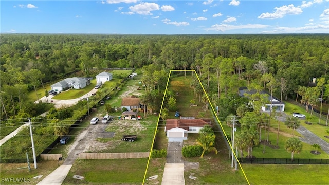 343 Golden Gate Blvd E, Naples, FL 34120 - aerial view of property's location featuring a heavily wooded area and property boundaries highlighted