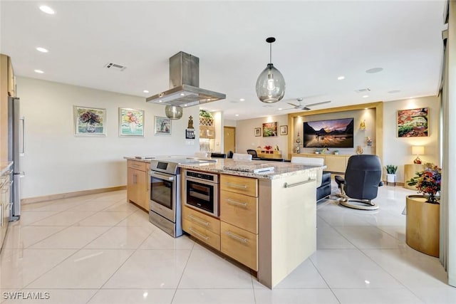 7105 Quail Run Ct W Unit 4, Fort Myers, FL 33908 - kitchen featuring stainless steel appliances, island exhaust hood, recessed lighting, light stone counters, and open floor plan