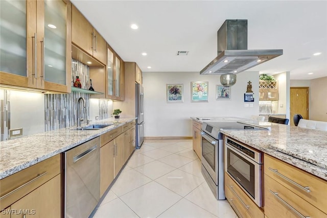 7105 Quail Run Ct W Unit 4, Fort Myers, FL 33908 - kitchen featuring appliances with stainless steel finishes, island exhaust hood, light stone countertops, recessed lighting, and light tile patterned floors