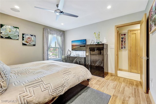7105 Quail Run Ct W Unit 4, Fort Myers, FL 33908 - bedroom featuring light wood-type flooring, recessed lighting, and ceiling fan