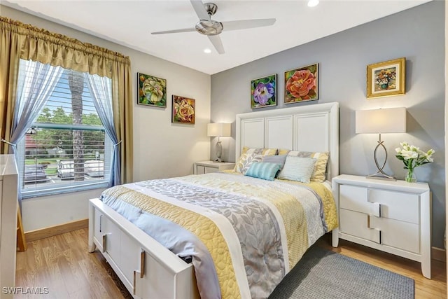 7105 Quail Run Ct W Unit 4, Fort Myers, FL 33908 - bedroom with light wood finished floors, recessed lighting, and a ceiling fan
